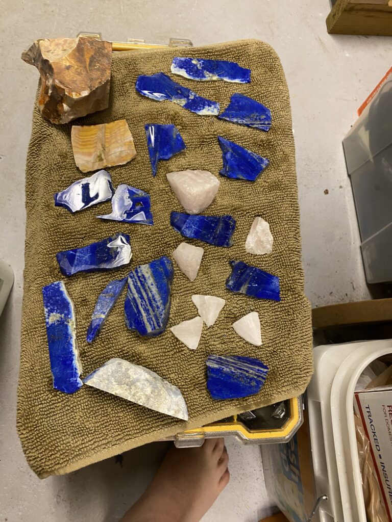 Miscellaneous stone slices, mostly lapiz lazuli